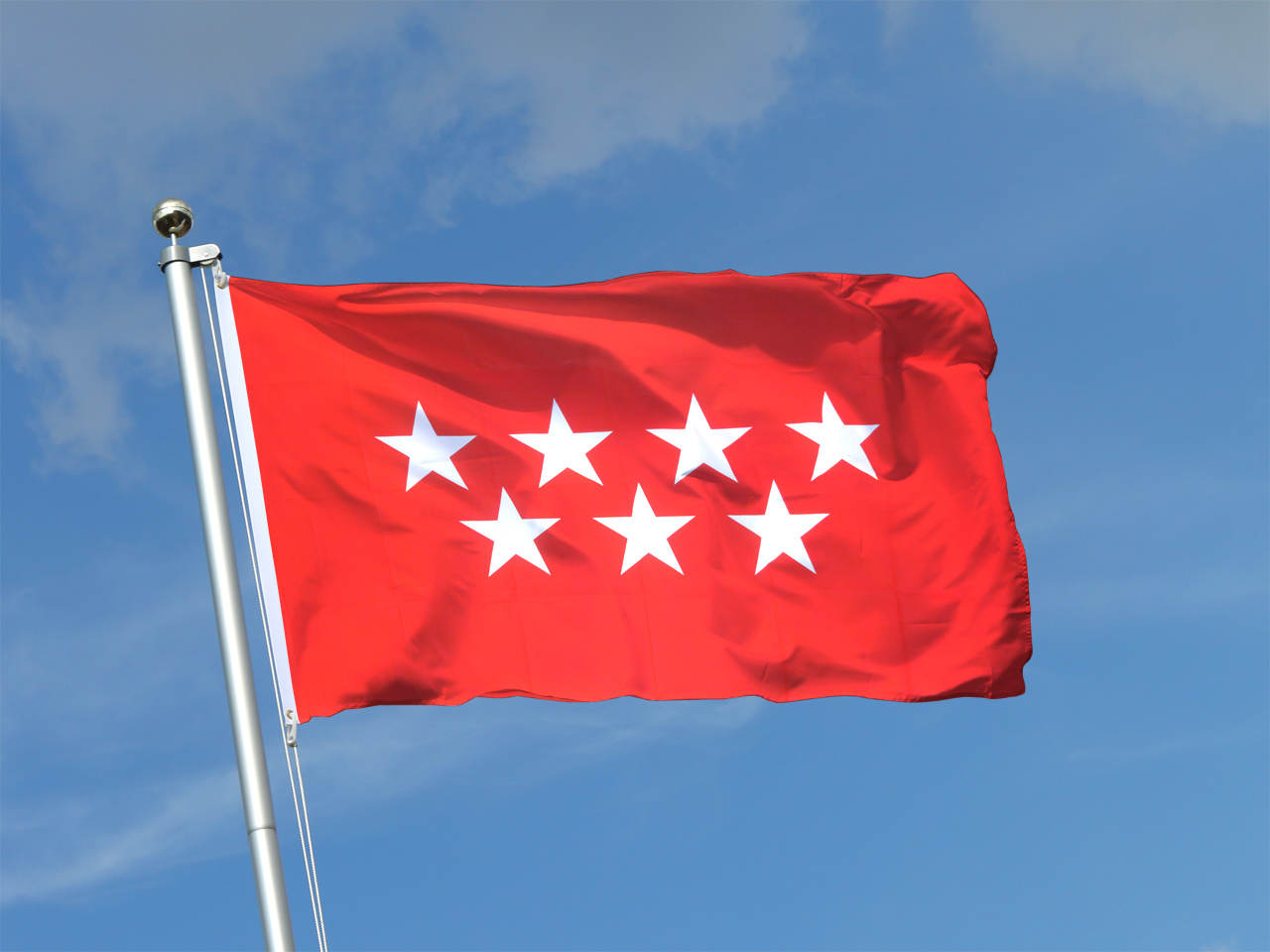 La bandera de la Comunidad de Madrid, capital de España.