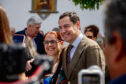 DOS HERMANAS (SEVILLA), 03/05/2026.- El presidente del PP de Andalucía y candidato a la reelección de la Presidencia de la Junta, Juanma Moreno, durante un acto celebrado este domingo en Dos Hermanas (Sevilla). EFE/Mauri Buhigas