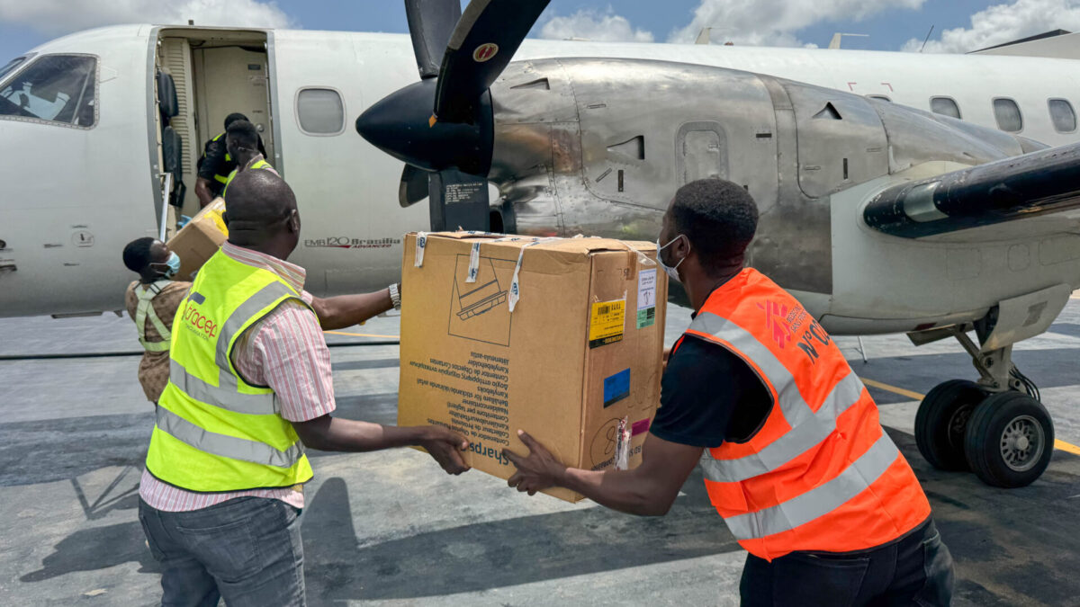 An MSF truck is loaded at Bunia airport with emergency response supplies delivered by cargo flight from MSF Support Unit Kampala (SUKA). The shipment includes 3,000 items of personal protective equipment (PPE) and medical supplies for the Ebola response.
