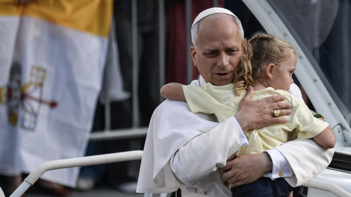 Barcelona (Spain), 09/06/2026.- Pope Leo XIV hugs a child at a prayer vigil at the Lluis Companys Olympic Stadium in Barcelona, Spain, 09 June 2026. Pope Leo XIV is visiting Spain from 06 to 12 June 2026, with stops in Madrid, Barcelona and the Canary Islands. (Papa, España) EFE/EPA/CIRO FUSCO