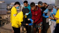 Ceuta (Spain), 18/09/2026.- A handout picture provided by Spain's Ministry of Inclusion, Social Security and Migration shows migrants who had been living at Benitez Beach arriving at a new temporary reception centre in Ceuta, Spain, 18 September 2026. The facility has capacity for 1,700 people. The relocation follows the arrival of thousands of migrants in Ceuta from Morocco in late July 2026. (Marruecos, España) EFE/EPA/MIGRATION MINISTRY / HANDOUT EDITORIAL USE ONLY ONLY AVAILABLE TO ILLUSTRATE THE ACCOMPANYING NEWS (MANDATORY CREDIT)HANDOUT EDITORIAL USE ONLY/NO SALES