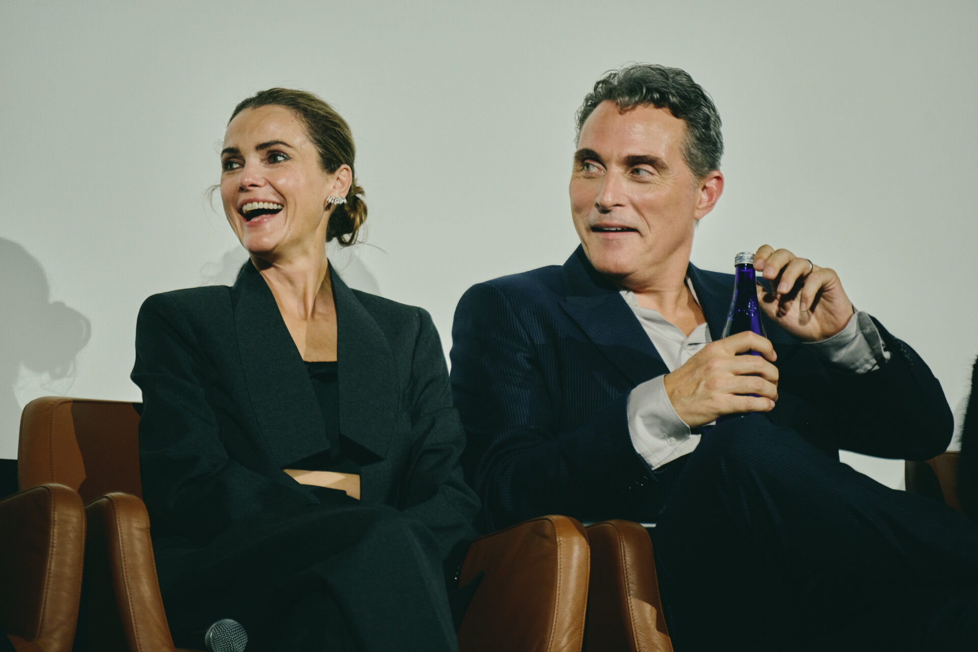 NEW YORK, NEW YORK - OCTOBER 12: (L-R) Keri Russell and Rufus Sewell speak onstage during The Diplomat Season 4 Special Screening at The Paris Theater on October 12, 2026 in New York City. (Photo by Jenny Anderson/Getty Images for Netflix)