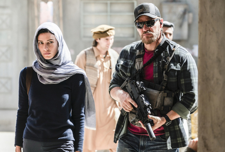 "No Choice in Duty" -- While Jason escorts Mandy on a condolence visit to the family of a fallen informant, Ray leads Bravo on an urgent mission when they are confronted with a time-sensitive lead on a terrorist leader's location. Also, Davis reveals to the team that the terrorist leader they've been searching for is related to a target from Jason's past, and Sonny rejoins Bravo team in Afghanistan, on SEAL TEAM, Wednesday, May 6 (10:00-11:00 PM, ET/PT) on the CBS Television Network. Pictured L to R: Jessica Paré as Mandy Ellis and David Boreanaz as Jason Hayes. Photo: Aaron Epstein/CBS ©2020 CBS Broadcasting, Inc. All Rights Reserved.